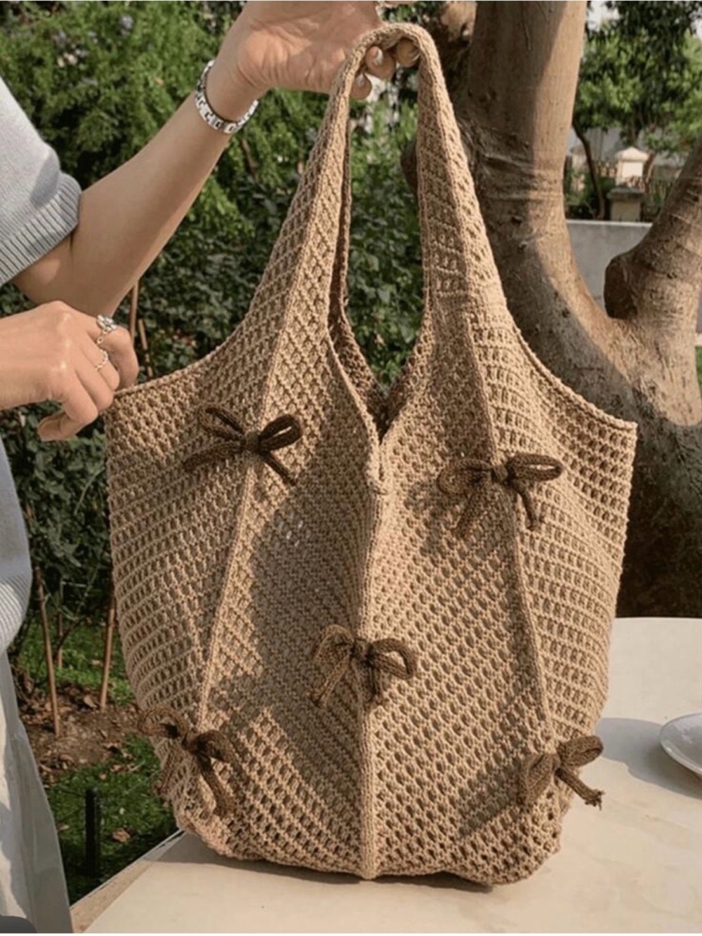 Free People Handwoven Beige Crochet Tote Bag with Bow Accents - Picture 5 of 6